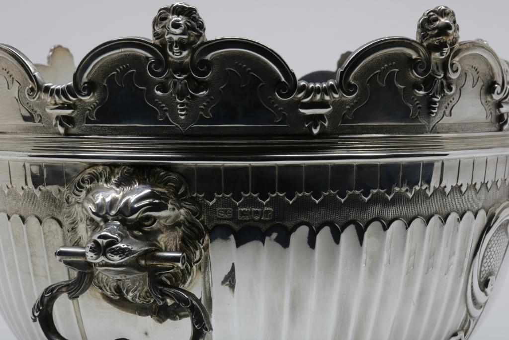 A sterling silver monteith or cooler, decorated with two cartouche medaillons, mascarons at the - Image 4 of 4