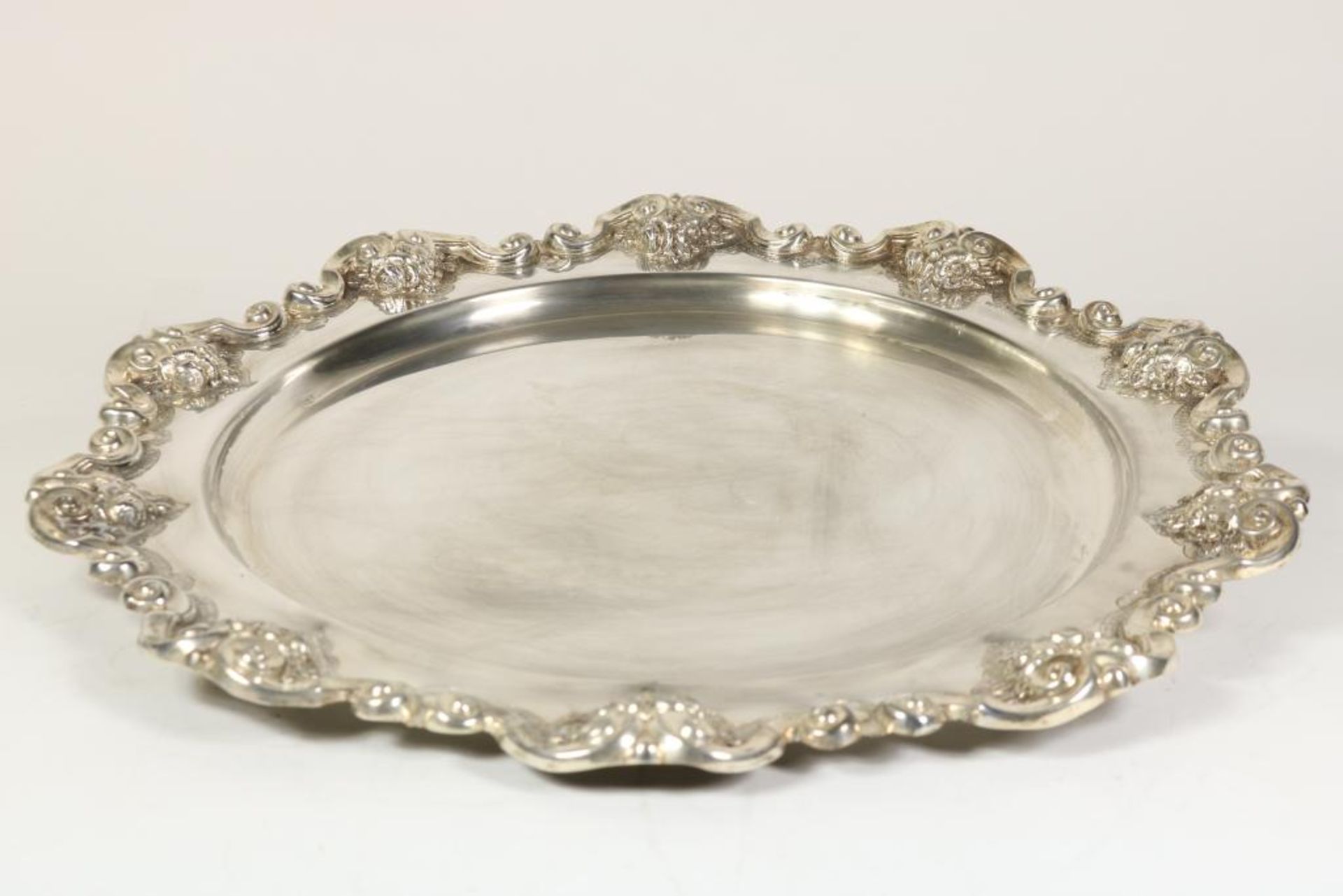 A lager silver plate with embossed edge with floral and cartouches, 925/000, gross w. 1300gr,