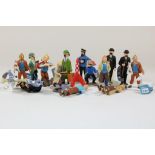 Lot of 16 Tintin figurines.Lot van 16 kunststof sculptuurtjes uit Kuifje, w.o. Kuifje, kapitein