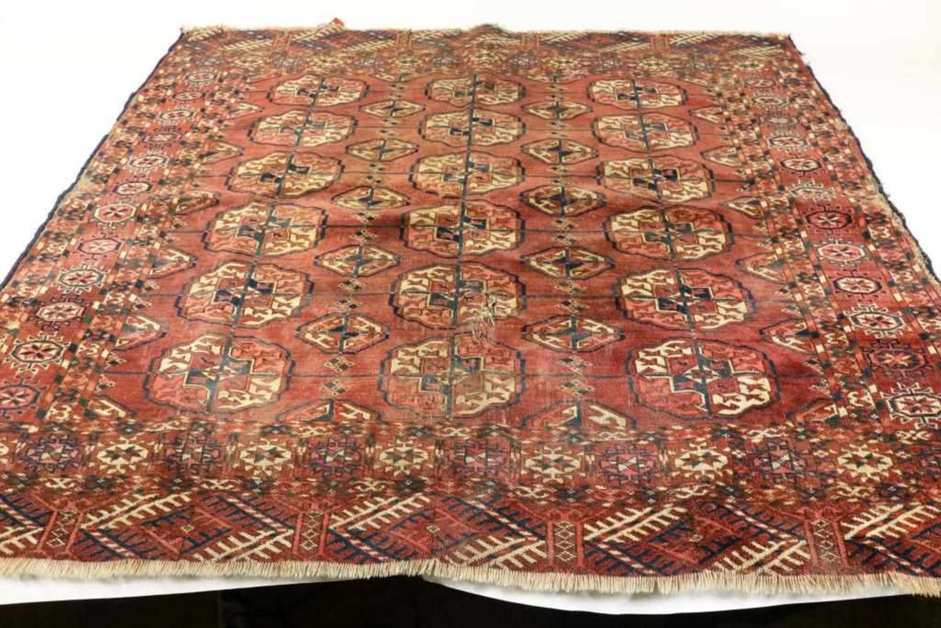 Antique Bokhara fragment/ carpet, 112 x 120 cm.Antiek Bochara handgeknoop fragement, 112 x 120