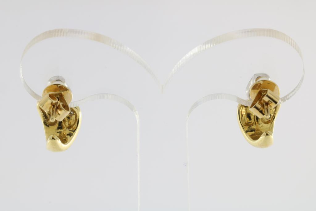 A pair of white and yellow gold earrings set with diamonds, 585/000, gross w. 6gr, length 1.5cm. - Image 3 of 3