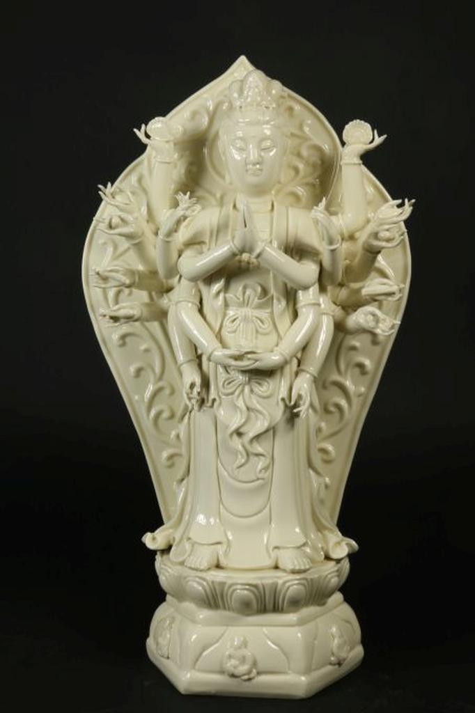 Blanc de chine Guanyin with a thousand arms, mark on the back, China 20th century, h. 54 cm.Blanc de