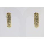A set of yellow gold creool earrings partly set with brilliant cut diamonds, total ca. 1.26ct, gross