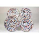 A set of 4 porcelain gold Imari plates, decorated with dugs, flowers and scroll, China 18th century,