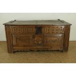 Oak blanket chest with carved frieze and 2 panels with fabulous creatures, Germany 18th century,