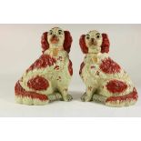 a pair of porcelain Staffordshire dogs, h. 33 cm.Stel porseleinen van Staffordshire honden,