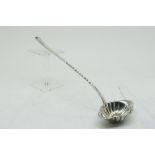 A silver punch spoon, Germany l. 31cm.Zilveren punchlepel, ovaal schelp bak, met getorste steel en