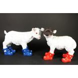 Pair of plastic sculptures of little goat and lamb in colourful rainboots, h. 32 cm.Stel