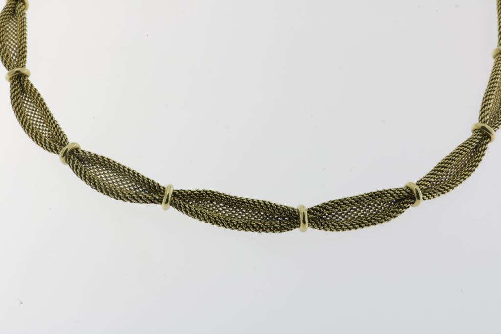 A yellow gold, braided necklace, 585/000, br.gew. 30,2gr, length 44,5cm.Een geelgoud gevlochten - Image 2 of 3