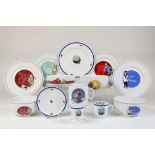 Lot of 13 porcelain Tintin plates and cups.Lot van 5 porseleinen borden, 4 schalen, kop en