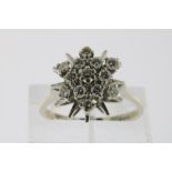 White gold cluster ring with brilliant cut diamonds, total ca. 0.73ct, 585/000, gross w. 5 gr, seize