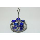 A silver table stand with dif. blue glas liners, mm Philippe Wolfers, retailers marks of Wolfers