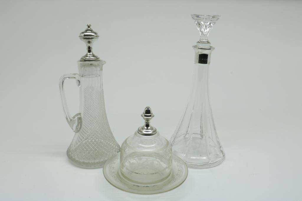 Lot with crystal carafs, one with sterling silver manchet, crystal jug with plated top (