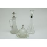 Lot with crystal carafs, one with sterling silver manchet, crystal jug with plated top (