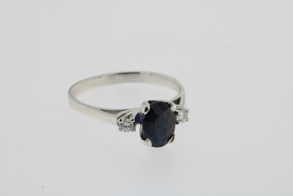 A white gold ring set with a sapphire, ca. 1.80ct, and brilliant cut diamonds, total ca. 0.12ct,