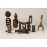 Lot of 9 African objects, w.o. Sepik, 2 Mossi flutes, Akan hair comb.Lot van 2 Sepik