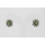 A pair of white gold earrings mounted with green sapphire 1.96ct. and brilliants ca. 1.04ct.