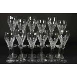 Set of 6 chrystal red winglasses and 6 chrystal white wineglasses, h. 25 cm. en 22 cm.Set van 6