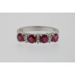 A white gold ring mounted with brilliants and rubies ca. 1.52ct. size 17.5, w. 3.9gr. 18kt.Witgouden