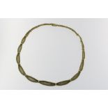 A yellow gold, braided necklace, 585/000, br.gew. 30,2gr, length 44,5cm.Een geelgoud gevlochten