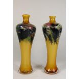 Pair of polychrome glass vases, h 43 cm.Stel meerkleurige glazen balustervormige vazen, h. 43 cm.