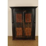 Pinewood black lacquer painted cabinet with 2 panel doors with decor of flowers in vase, Austria ca.