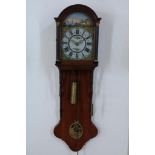 Frisian tail clock in oak case with painted dial, 19th century.Friese staartklok in eiken kast met