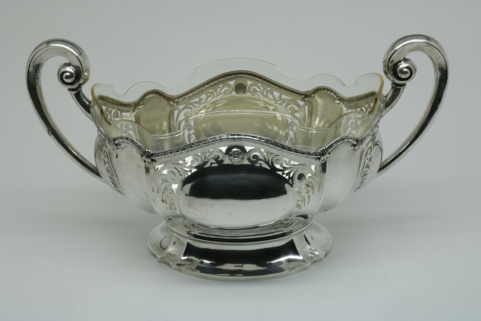 A silver centre piece with glas liner, 19th C. Germany, mark unidentiefied, 800/000, gross w. 1.