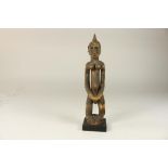 Wooden Dogon-style female sculpture, Mali, h. 33 cm.Houten Dogon-stijl staand vrouwenfiguur met