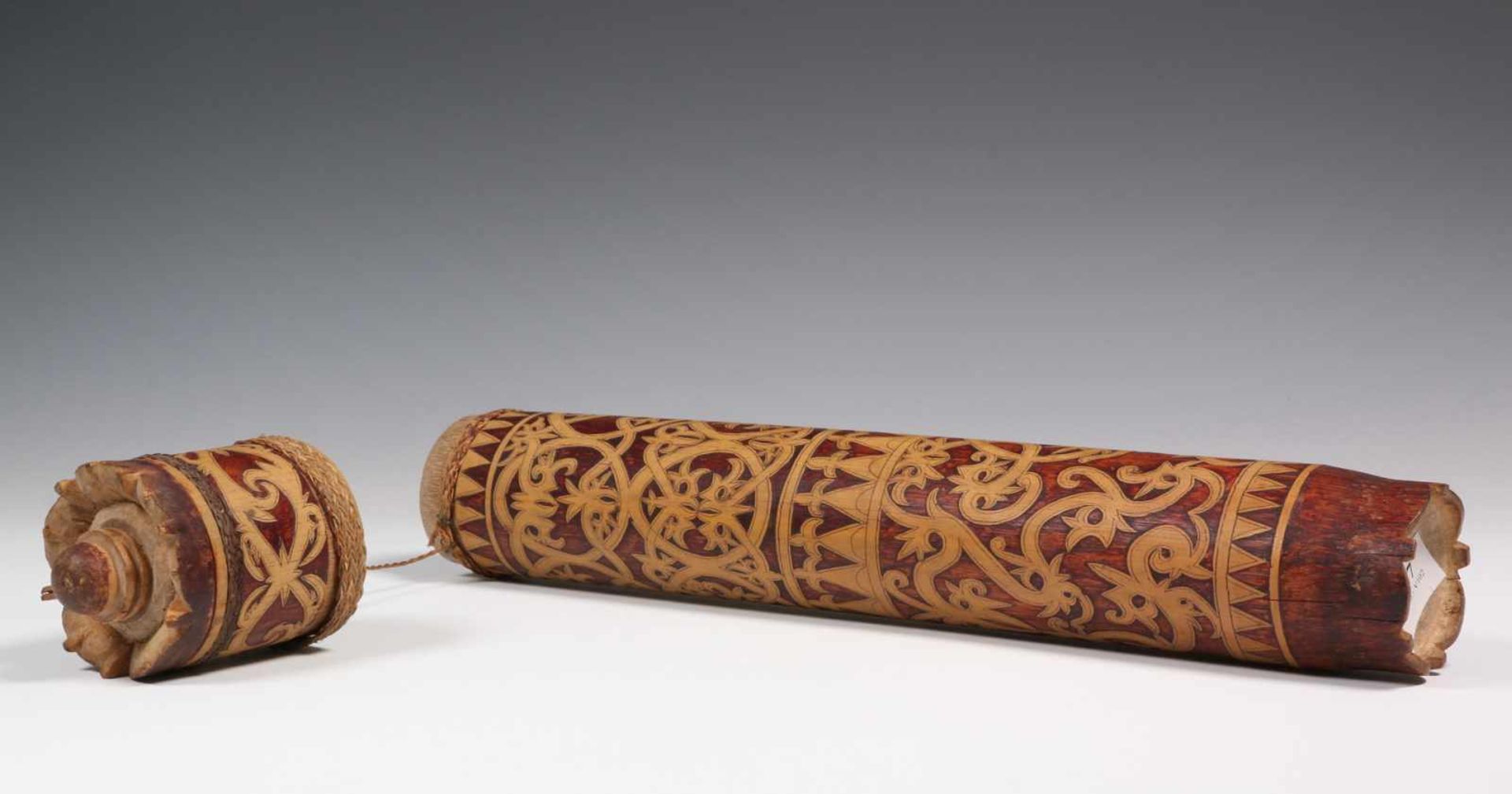 Borneo, Dayak, arrow containerwith finely carved floral patterns, h. 49 cm. [1]300