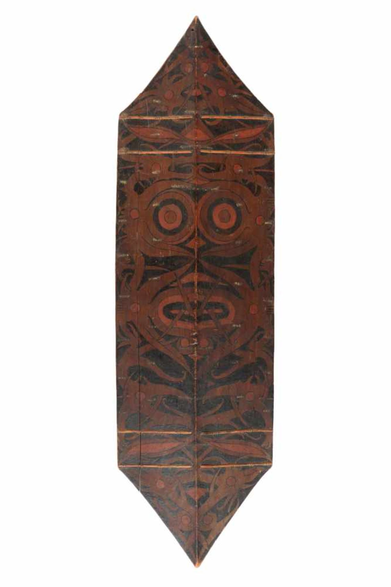Borneo, Dayak, war shield, ca. 1900.With a painted central mythological figure and fine curved