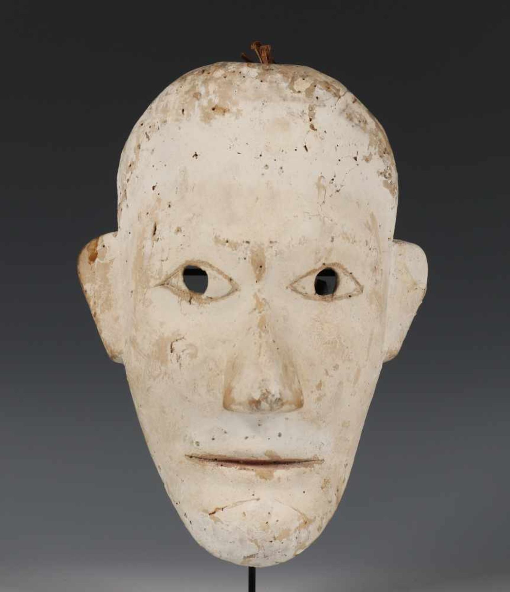 Borneo, Iban Dayak, white pigmented hunters mask, ca. 1920with layers of kaolin, plantfiber bindings