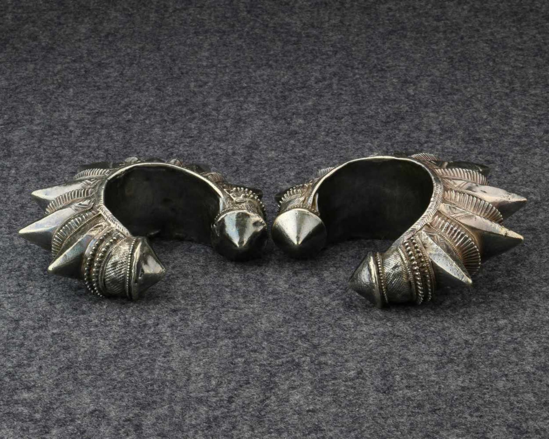 Pakistan, a pair of hollow silver woman's bracelets, 'Gokhru',with spikes, designed to protect the