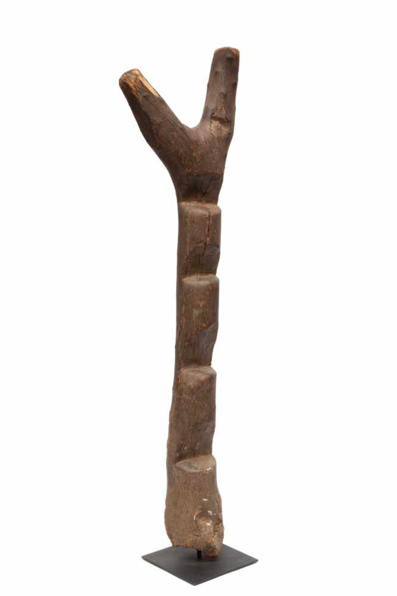 Dogon, wooden granery ladder,with four steps and Y-shaped ending, with grey - brown patina.