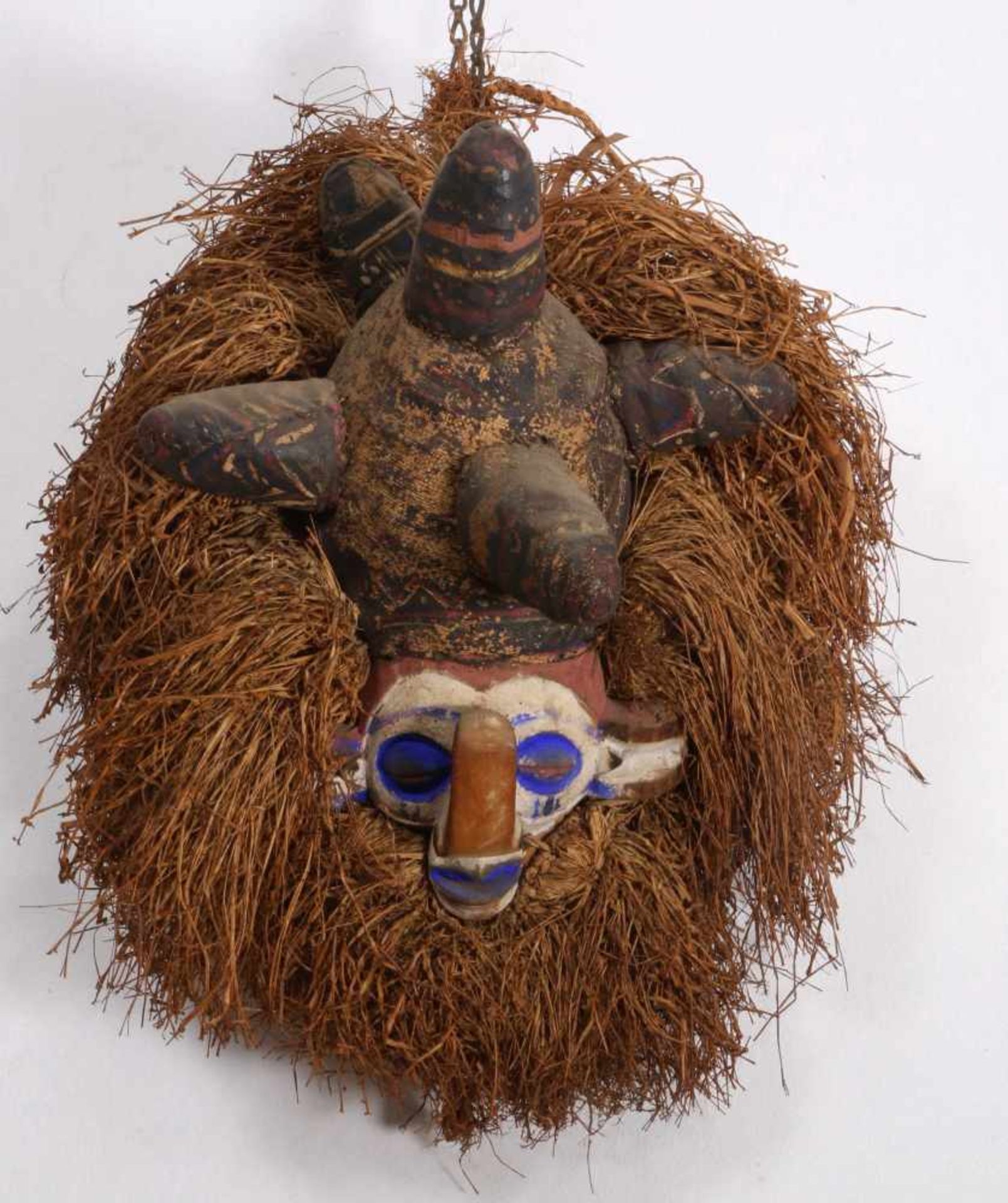 DRC., Nkanu, hand held maskwith elaborate hairstyle and large upright bent nose. With blue, zwart,