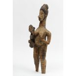 Nigeria, Ibo, mother figure with child.