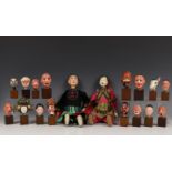China, collectie beschilderde houten poppenhoofden en twee complete poppen, 20e eeuw,