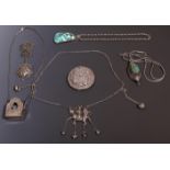 Tibet, collection of five silver chained necklaces with big pendants and one pendant with small turq