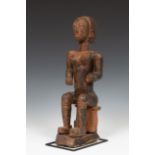 Ghana, Akan, wooden female seated figure