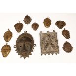 West Africa, collection of ten small, decorative, copper alloy masks
