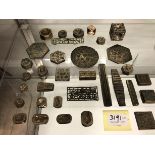 India, collection of brass and copper textile stamps and mold, and a multiple sided copper dice