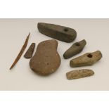 A collection of five antique stone axes, some 5th Mill BC.