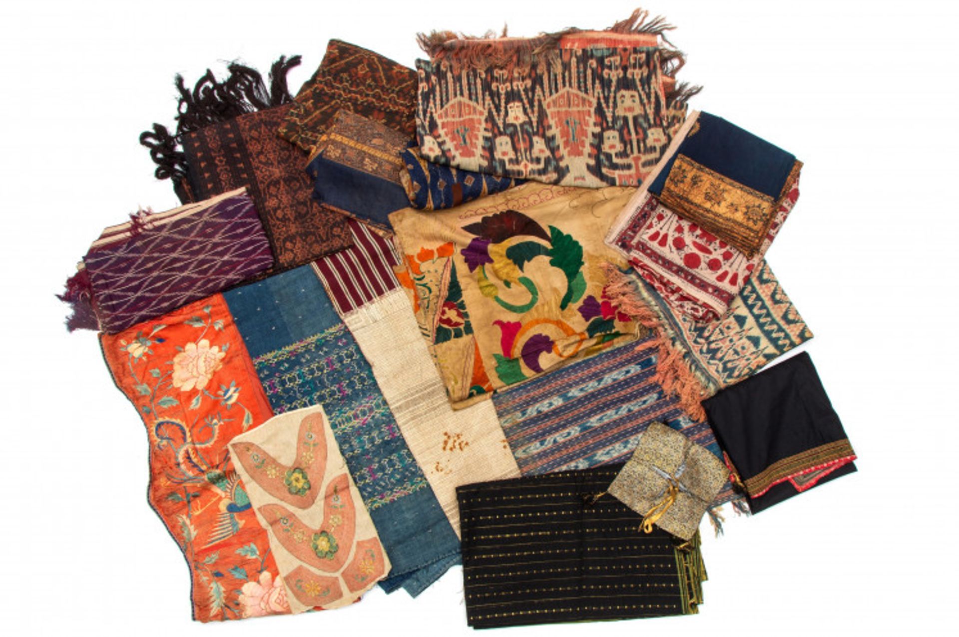 Southeast Asia, collection of circa twenty pieces of textile ikat, batik, embroidery