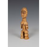 DRC., Lega, standing ivory figure.