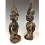 Nigeria, Yoruba, a male and female Ibeji figure,