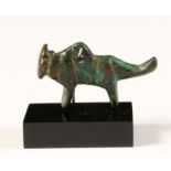 Luristan, bronze animal form with flattend face and a small eye pierced at its back, possibly 1st Mi