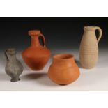 Two Roman terracotta ewers and a pot, 1st-3rd century