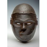 Nigeria, Ibibio, black painted sickness face mask,