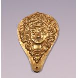 Bali, oval metal amulet,