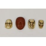 Japan, drie ivoren netsuke in de vorm van noh-maskers, 19e eeuw,